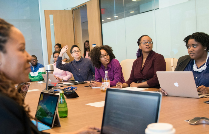 A team talk about mental health in a workplace meeting